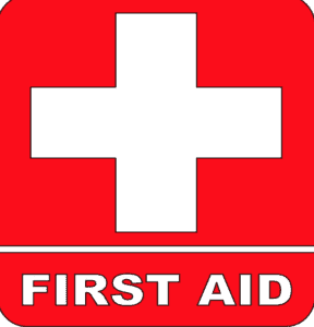 Red cross symbol with "FIRST AID" text, emphasizing essential travel safety and emergency preparedness tips.
