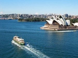 Superyacht cruising in Cebu waters, showcasing luxury tourism and scenic views of the coastline.