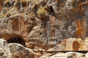 Ancient rock-hewn tombs at Caesarea National Park, Israel, showcasing archaeological significance and historical features.