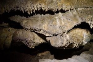 Stalactites and rock formations in a cave, showcasing natural geological beauty in Southern California.