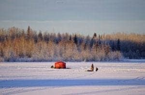 A person riding a horse in the snow - 09738