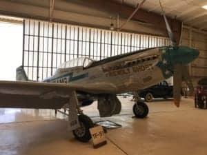 A small airplane hanging from the ceiling - Aviation