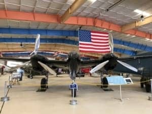 A fighter jet sitting on top of a building - Aviation