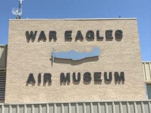 A sign on the side of a building - Facade