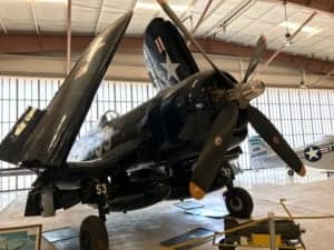 A fighter jet sitting on top of a ramp - Aviation