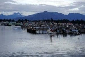 The Amazing Fishing Village Of Saint Petersburg, Alaska - A boat is docked next to a body of water - Petersburg