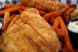 A close up of a plate of food - French fries