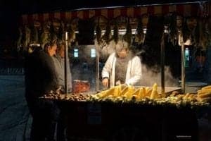 A Culinary Adventure In Istanbul Turkey - A person standing in front of a store filled with lots of fresh produce -