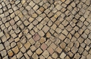 Discovering The Mysteries Of The Belem Tower In Lisbon Portugal - A close up of a brick building - Belém Tower