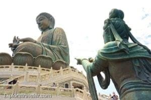 Discovering The Sights And Scenes Of Hong Kong - A statue of a man - Tian Tan Buddha