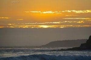 Beautiful Misty Evening On The Big Sur Beach In California - A sunset over a body of water - Big Sur