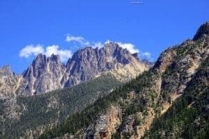 Exciting Photo Journeys In The Northern Cascades Of Washington State USA - A canyon with a mountain in the background - Cascade Pass