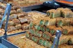 The Church Of The Annunciation In Nazareth, Israel - A bunch of food is on display - Kanafeh