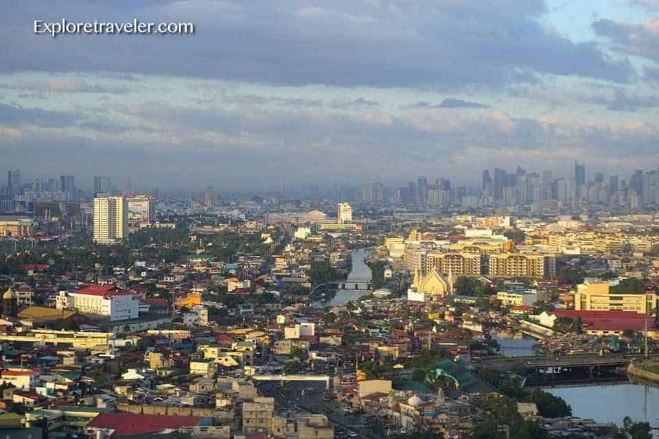 Isang Philippine Photo Album na Puno ng Pakikipagsapalaran - Isang malaking anyong tubig na may background na lungsod - Maynila