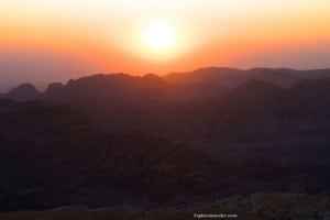 Sunrise over the mountainous landscape of Jordan, highlighting the natural beauty and scenic views, relevant to travel experiences showcased by ExploreTraveler.