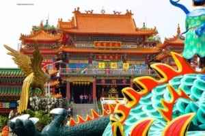 Colorful temple architecture featuring ornate details and dragon sculptures, representing Taiwan's cultural heritage and attractions.