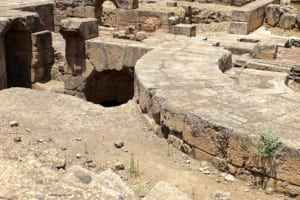 Ruins of Agrippa Palace in Caesarea Philippi, featuring stone structures and pathways, highlighting the historical significance of the archaeological site.