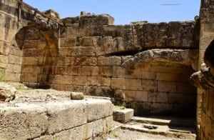 Ruins of Agrippa Palace in Caesarea Philippi, featuring ancient stone walls and architectural remnants, highlighting historical significance for travelers.