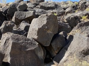 Rocks at Albuquerque's Petroglyph National Monument showcasing ancient petroglyphs and natural landscape.