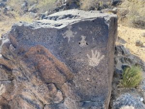 Hands and animals of Petroglyth Piedras Marcadas Canyon Trail