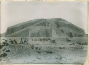 Ancient archaeological site featuring a large stepped structure with surrounding tents and figures, representing historical travel destinations and exploration.