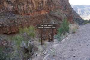 walking along the falls trail in bandelier national monument