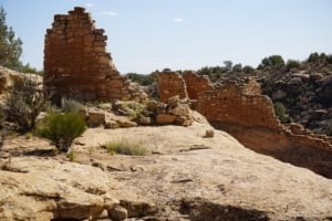 Ruins of the Unit Type House in Hovenweep National Park, showcasing ancient Pueblo architecture against a rocky landscape.