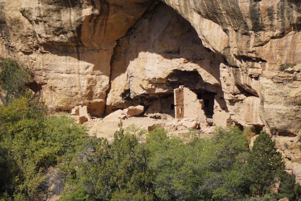 Mesa Verde ruins show a location built into the cliff gap.