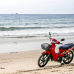 Image of scooter with beach view