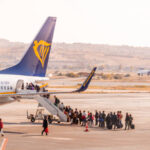 Passengers entering to the plane