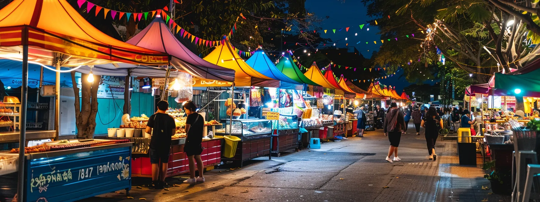 colorful dessert stalls lined up at the bustling kimberley street food night market.