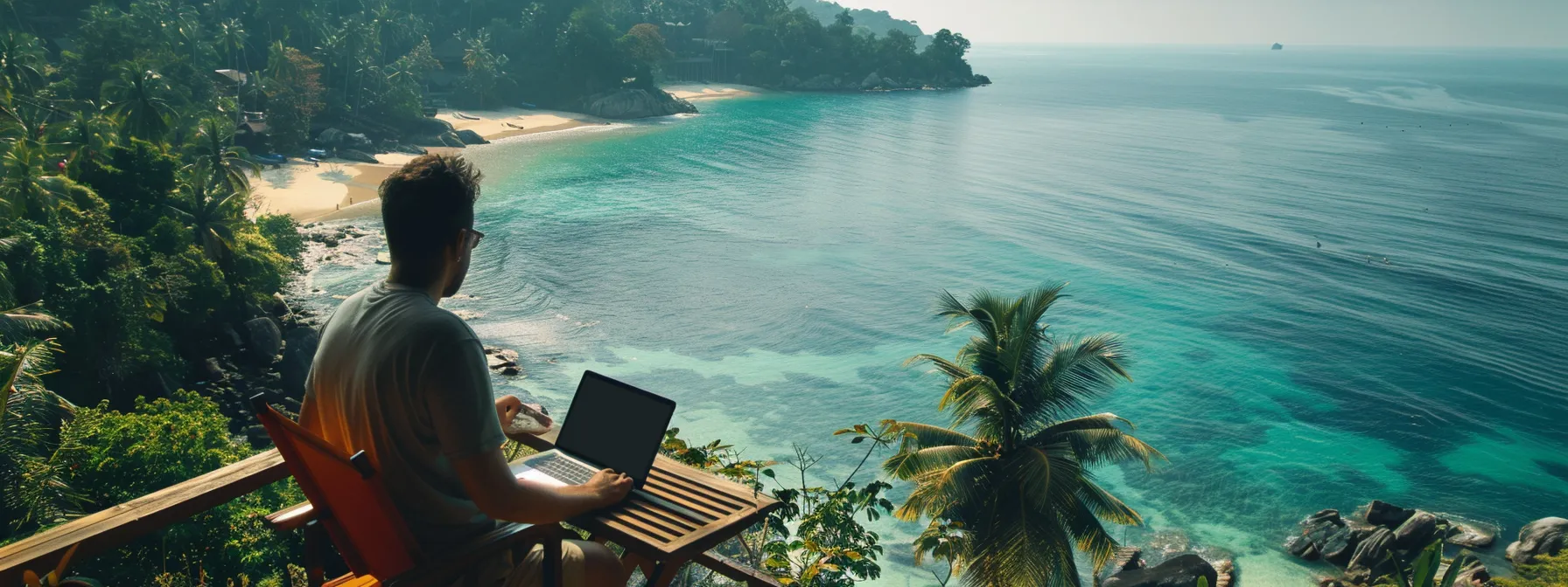 a digital nomad working on a laptop while overlooking a scenic beach.