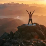 a person practicing yoga on a serene mountaintop at sunrise, showcasing the freedom and flexibility of a nomadic lifestyle.