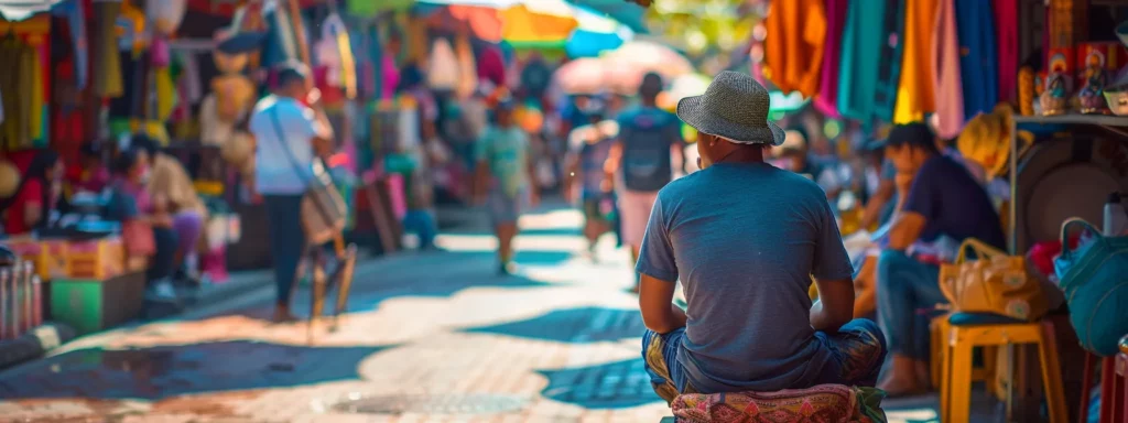 Enhancing Language Skills Through Nomadic Living Experiences 2 a traveler sits at a bustling outdoor market, surrounded by vibrant colors and diverse faces, immersing themselves in the local culture for accelerated language acquisition.